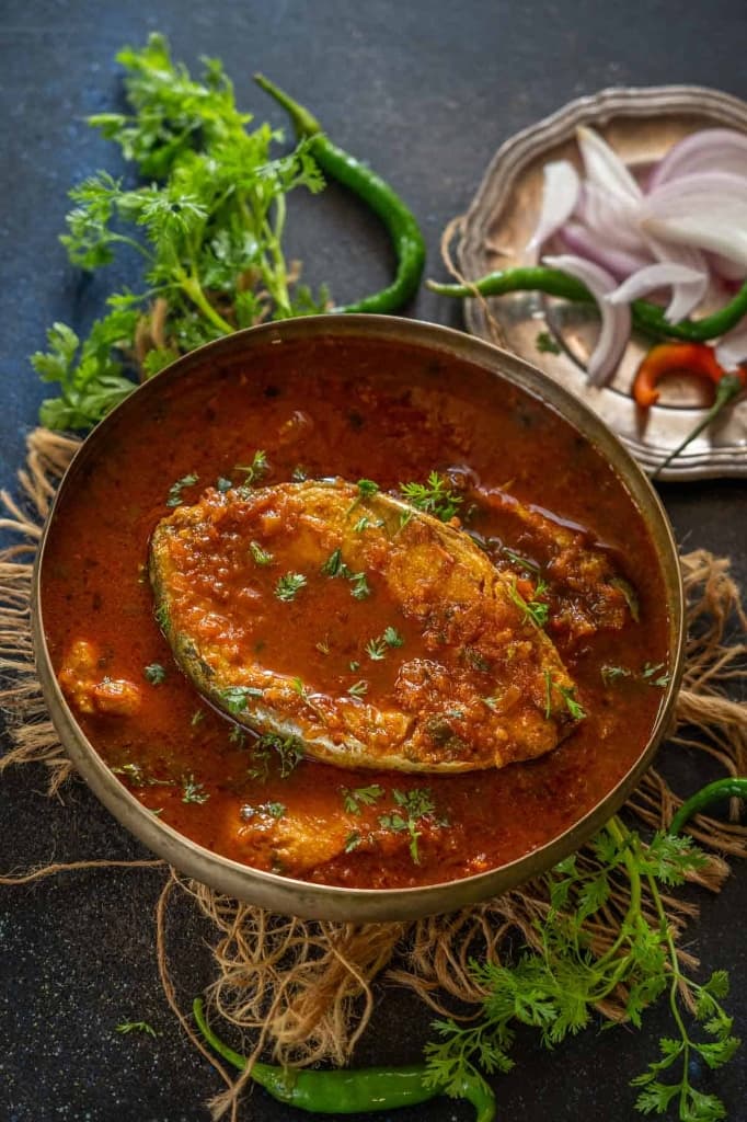 Boiling hot authentic red fish curry gravy photography